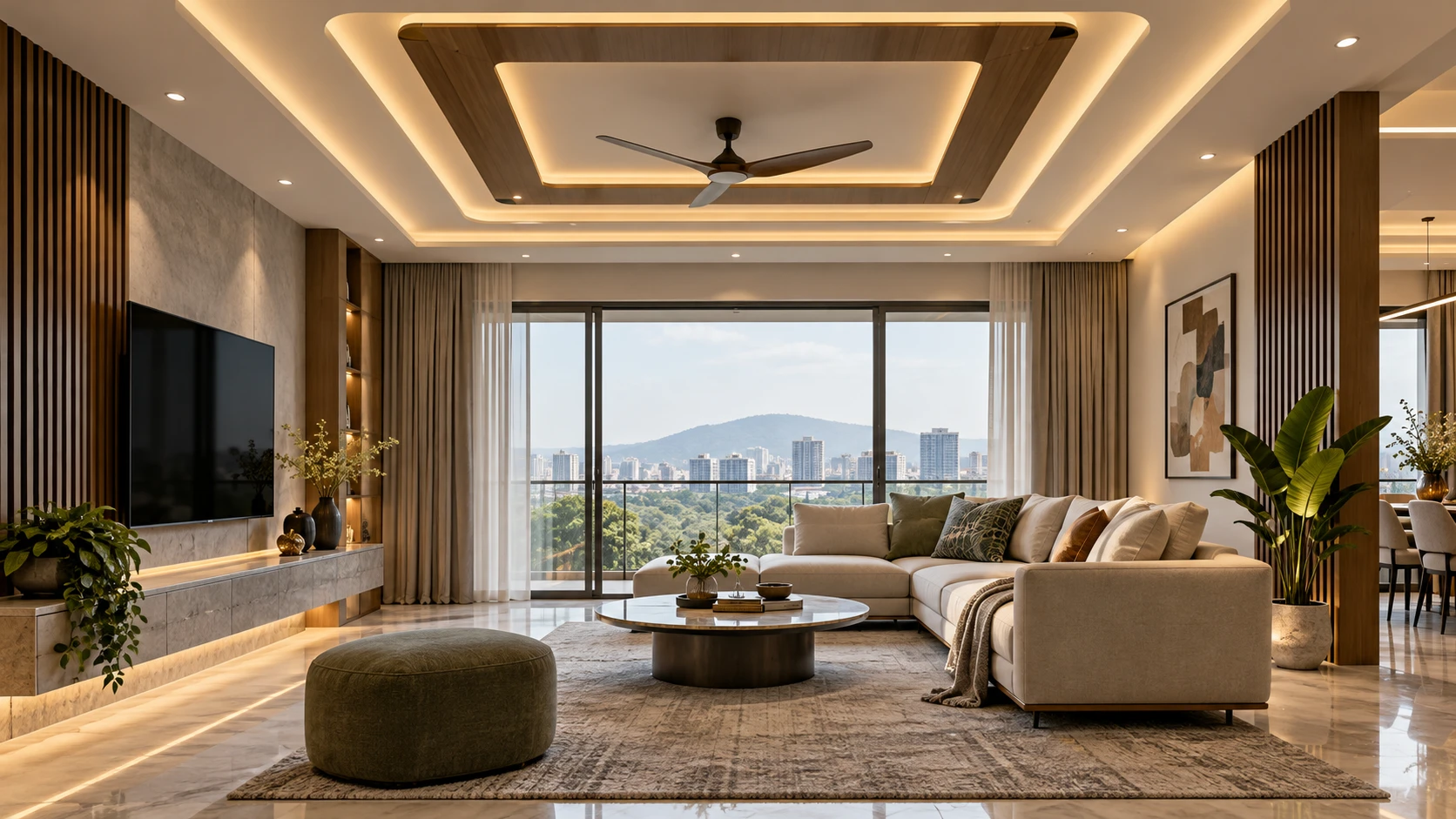 Living room with layered ceiling cove lighting, a wall-mounted TV, cream sectional sofa and balcony views.